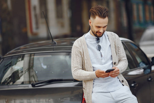 istock Young businessman in a summer city 1305039676