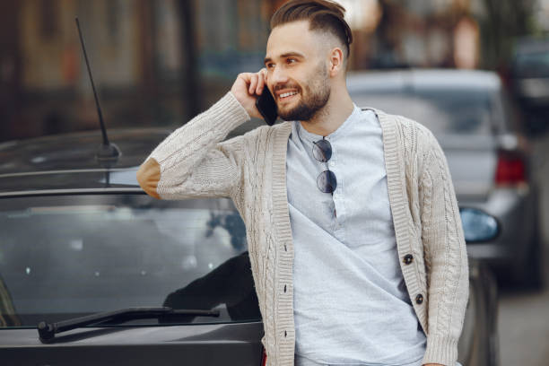 istock Young businessman in a summer city 1305039678