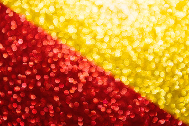 Blurred red and golden bokeh background. Abstract texture background.