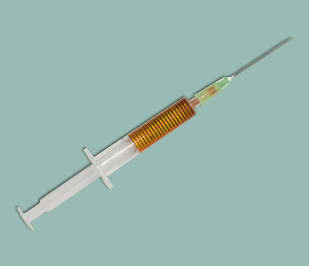 istock Syringe with needle and medicine 1305040828