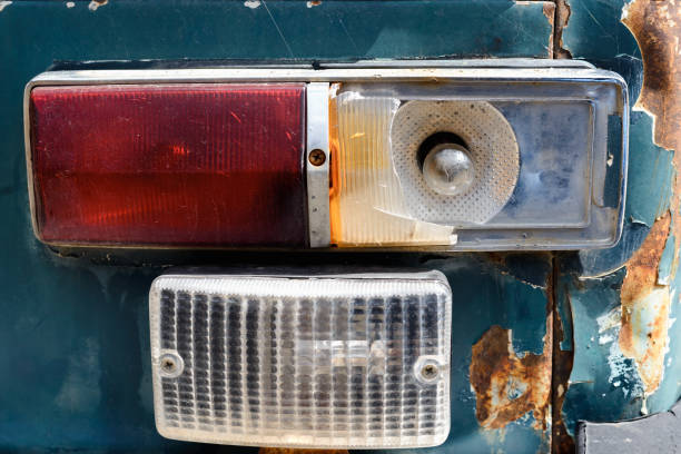 istock Broken headlight of an old car. Accident, insurance 1305045416