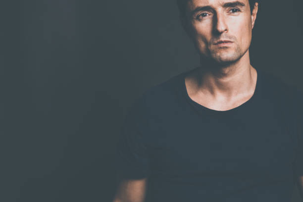 istock Young man suffering from anxiety, depression due to social seclusion, isolation 1305049563