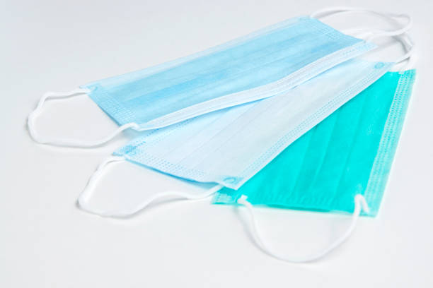 istock Face mask on white background, close-up. Coronavirus prevention 1305049700