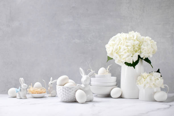istock Easter decorations such as porcelain bunnies and eggs on a kitchen countertop 1305051163