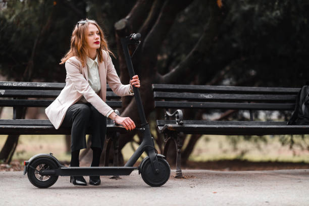 istock A young woman with electric scooter 1305052224