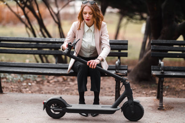istock A young woman with electric scooter 1305052240