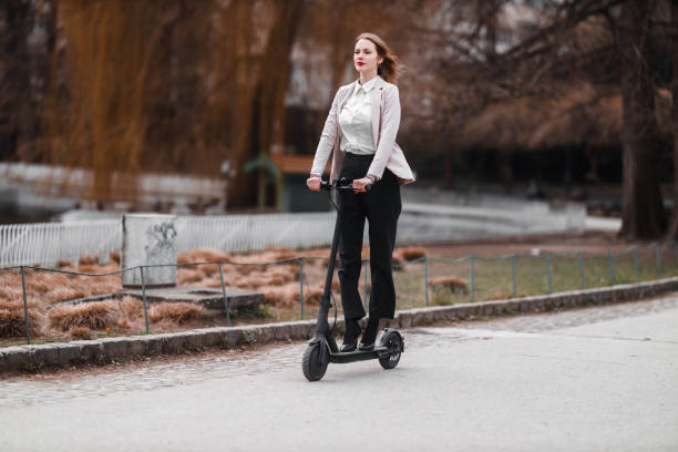 istock A young woman with electric scooter 1305052295