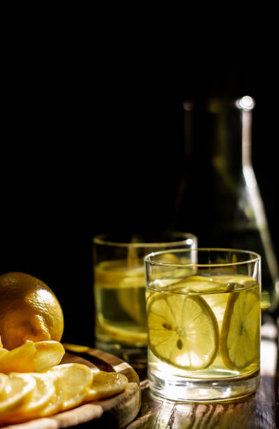 istock Fresh lemon juice. Moody background. 1305053678