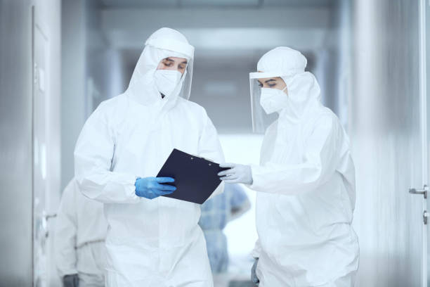 istock Doctors examining medical card 1305061029