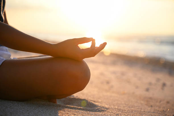 istock Meditation exercises on the beach 1305066409