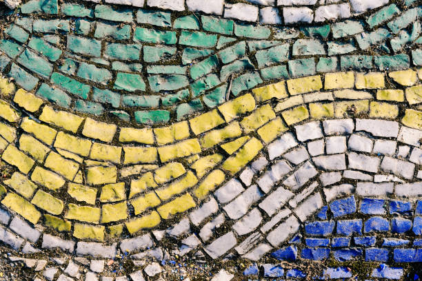 istock Abstract mosaic background. Colored geometric elements on the old floor. Ancient wall or floor interior. Architecture and decor 1305079464