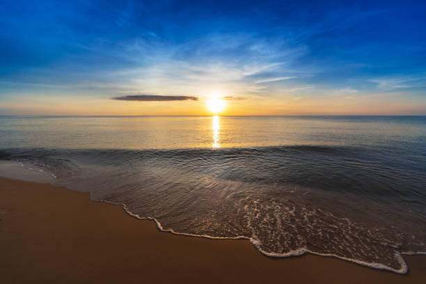 istock beautiful sunset over the tranquil ocean 1305079810