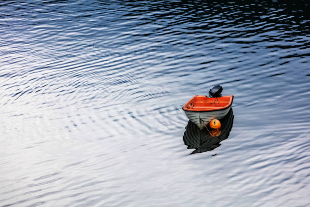 modern motor boat parked in calm water