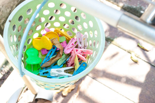 istock Plastic clothes pins in the bucket 1305080126