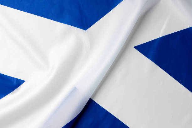 istock Folded national flag of Scotland, fabric background 1305084856