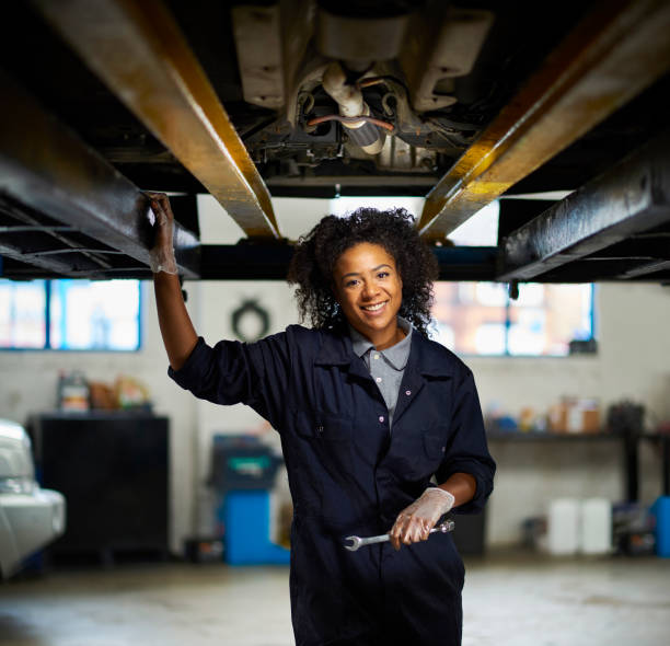 istock female mechanic portrait 1305087286