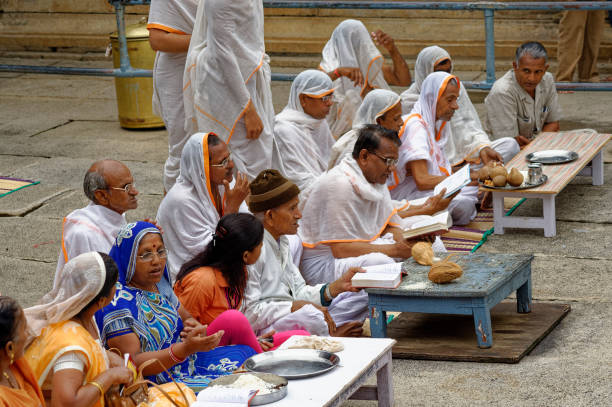 Male and woman devotee praying on Vindyagiri at Shravanbelagola in the Indian state of Karnataka