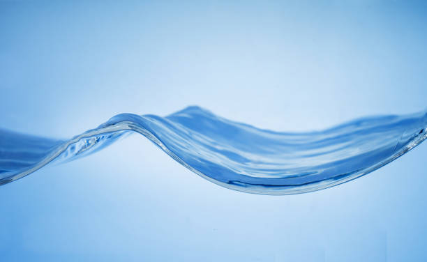 Side view of blue water waves Side view of blue water waves. h20 molecule stock pictures, royalty-free photos & images