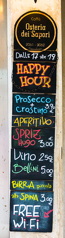 Venice, Italy - MAY 15, 2019: Promotional menu of the restaurant in Venice, prices and meals