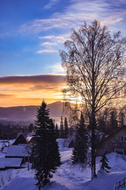 istock dawn in winter in the village 1305089575
