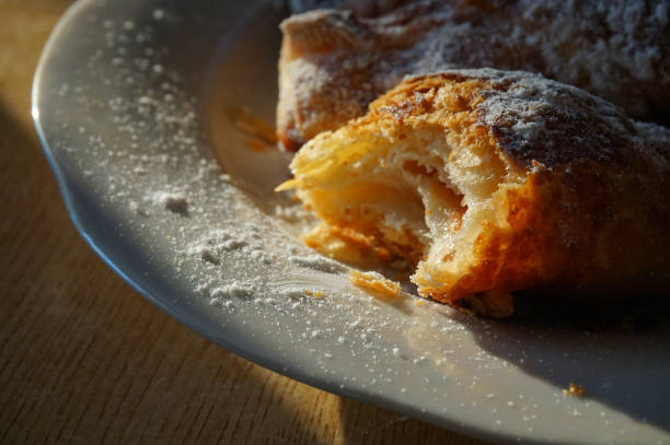 istock baked croissants with powdered sugar 1305096655