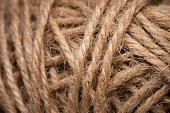 Natural jute twine, macro photography. Jute thread texture. A coil of jute rope. Close-up