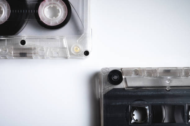 istock Audio cassettes on gray background retro background. Old sound recorders 1305099565