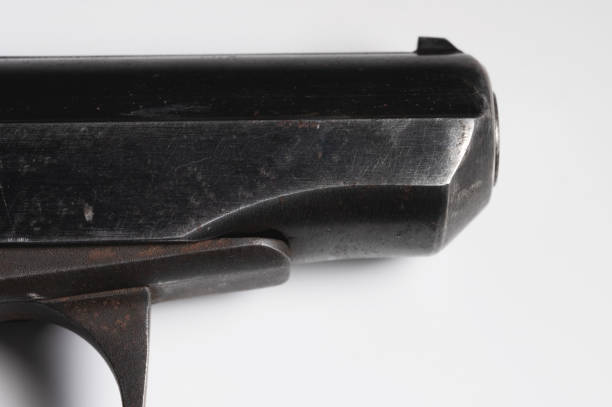 istock Old Soviet pistol. Close-up on white background 1305099576