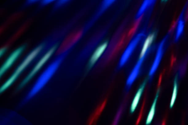 istock colorful neon light leaks on black background 1305100121