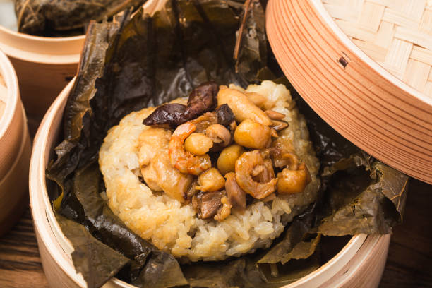 istock Steamed chicken with lotus leaf sticky rice 1305100348