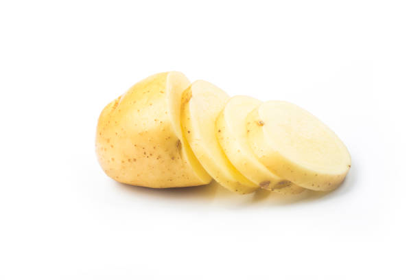 istock Potato slices turning into chips isolated on white background 1305102808