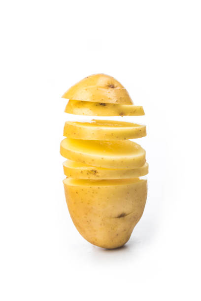 istock Potato slices turning into chips isolated on white background 1305102809