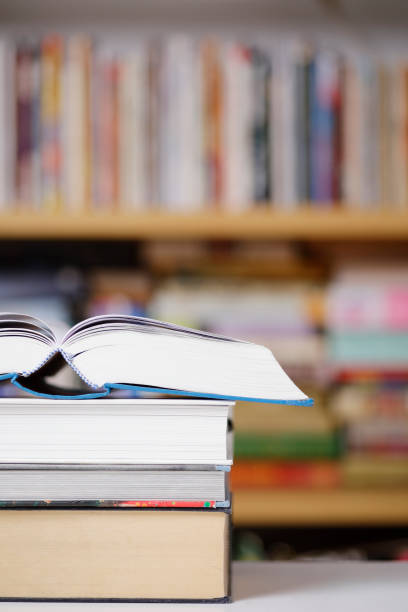 istock Open book close up at the library 1305104252