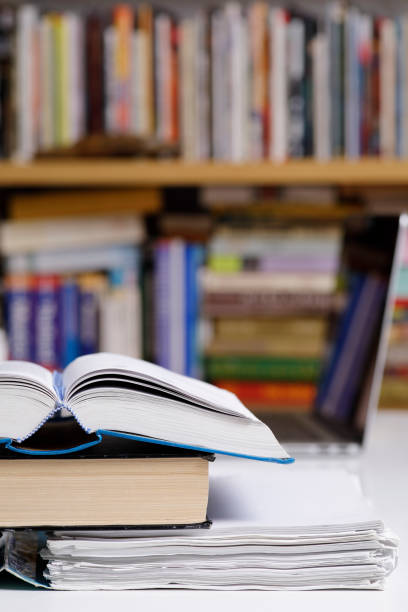 istock Open book close up at the library 1305107957