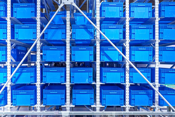 istock Blue Crate and Shelf at Distribution Warehouse 1305109444