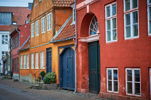 Elsinore is a popular coastal town in Denmark North to the capital Copenhagen on the island Zealand. The city  center has been well preserved with small and cozy streets and a lively main street often visited by big amounts of Swedish people who love coming here for buying beer which are difficult and expensive to achieve in Sweden.
Old colorful houses with cobble stone streets.