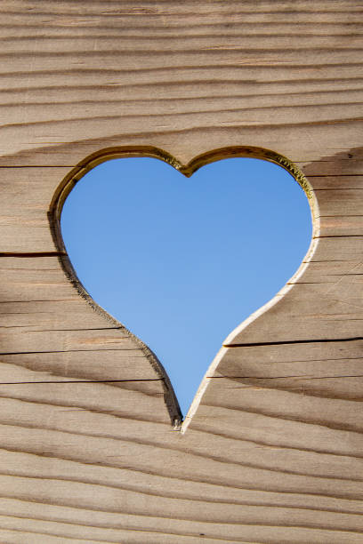 Blue heart in a wooden board