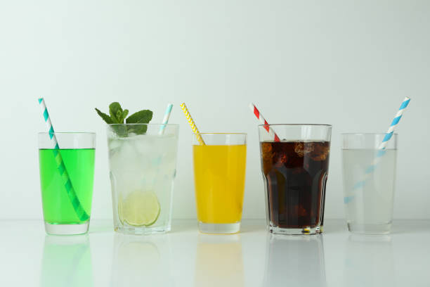 istock Glasses of different soda isolated on white background 1305116918