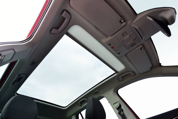 istock Panoramic sunroof in a passenger car 1305118000