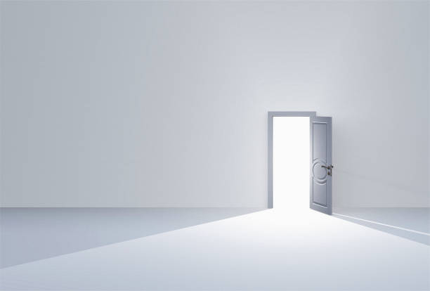 istock Doorway filling room with light 1305119166