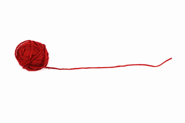 istock Ball of thread in red, on an isolated white background 1305122868