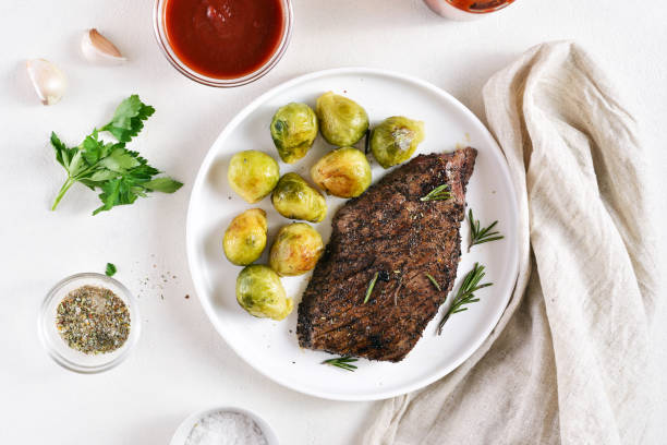 Grilled beef steak with brussels sprouts