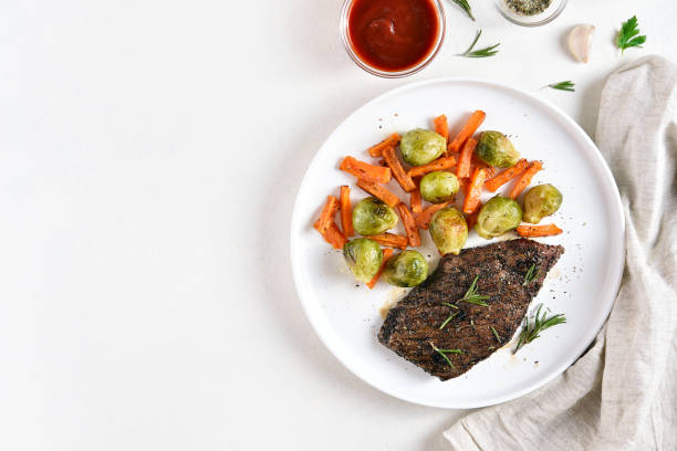Grilled beef steak with brussels sprouts