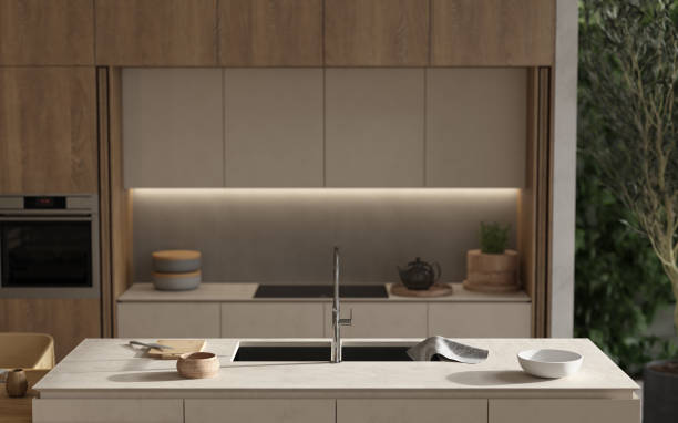 istock Minimalism modern interior scandinavian design. Studio living, kitchen and dining room. Decoration composition with wooden kitchen, kitchen island, green plants and dishes. 3d render. 3d illustration. 1305128810
