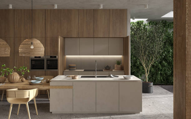 istock Minimalism modern interior  scandinavian design. Bright studio living, kitchen and dining room. Wooden kitchen with kitchen island, green plants and table with dishes. 3d render. 3d illustration. 1305128813