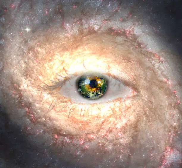 Photo of Eye in midst of Galaxy with Earth Reflection
