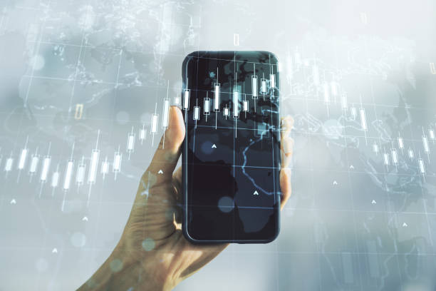 istock Multi exposure of abstract creative financial chart with world map and hand with cell phone on background, research and analytics concept 1305131206