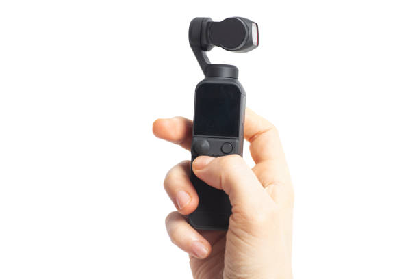 istock Hand hold action camera isolated on white background 1305133555