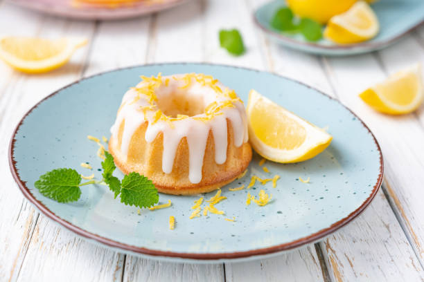 istock Mini lemon bundt cakes topped with lemon glaze 1305136858