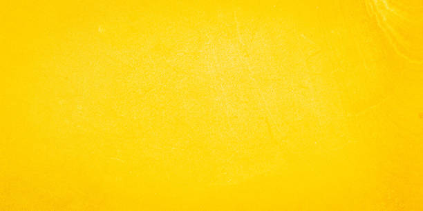 istock Abstract yellow watercolor painted paper texture background banner 1305137152